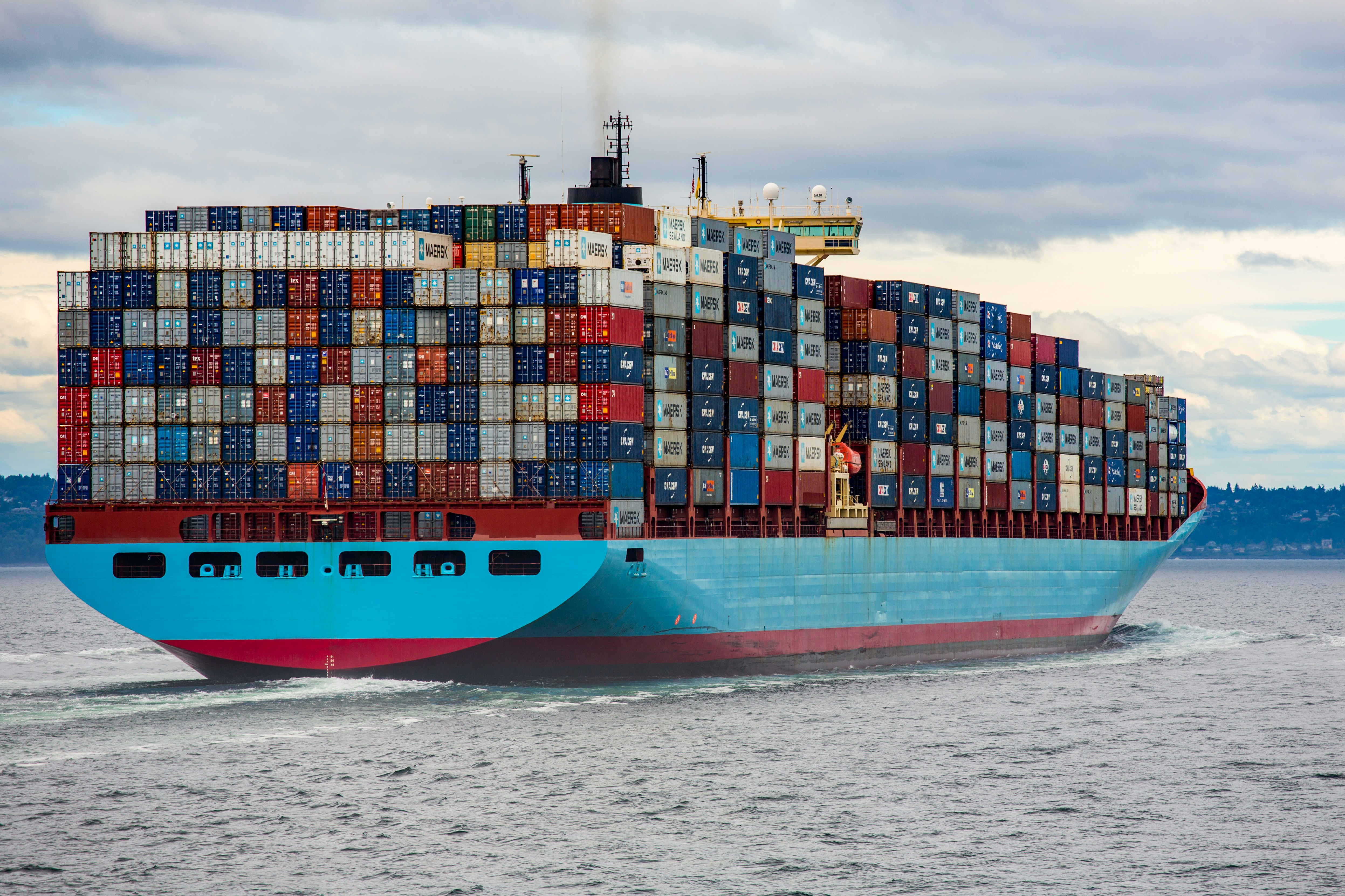 Cargo vessel loaded with containers at sea
